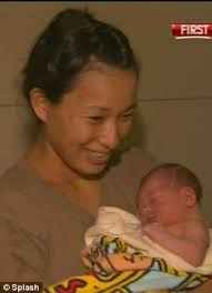 Hero: British midwife Carol Weeks delivered a baby (pictured with her jubilant mother Akiko Pruss) at an evacuation centre in Cairns, Queensland, ... - 7393191abf547906_2