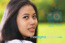 This royalty free photo, &quot;Beautiful Thai Woman&quot;, can be used in business, personal, charitable and educational design projects: it may be used in web design ... - beautiful-thai-woman-100210090