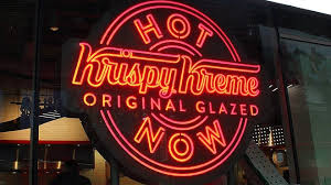 You can get a free Krispy Kreme Original Glazed doughnut on Saturday. 
Here's how.