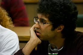 ASUO Vice President Maneesh Arora listens to the proceedings during OSPIRG&#39;s hearing before the Athletics and Contracts Finance Committee Wednesday, ... - 0202ACFC10