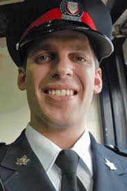 John Zivcic died Monday of injuries suffered in a car crash while on duty Saturday. (Toronto Police Service). Deputy Chief Peter Sloly made the announcement ... - zivcic-vertical