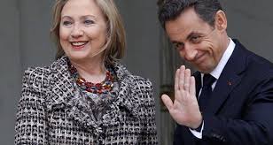 Image result for hillary clinton with gaddafi son