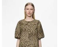 Image of fashion model wearing a Beaumont animal print dress