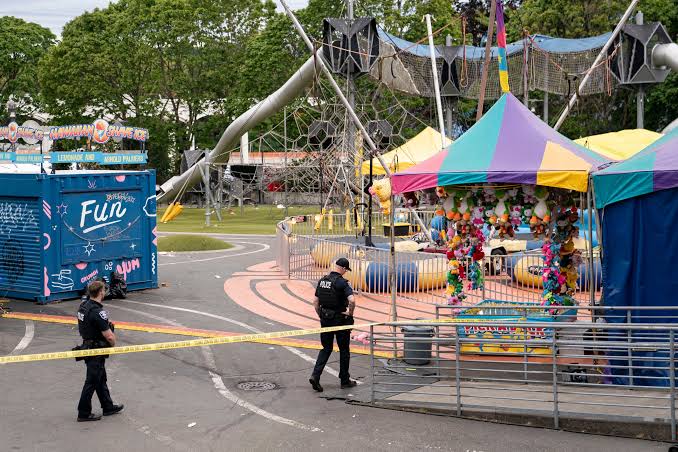 Shooting at Seattle Center food festival leaves three dead and five injured; police search for second suspect.