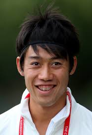 Kei Nishikori of Japan smiles before a practice session during previews for Wimbledon Championships at Wimbledon on June 23, 2013 in London, England. - Kei%2BNishikori%2BChampionships%2BWimbledon%2B2013%2BhQcYDMyOhfSl