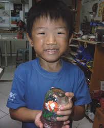 Nicholas and his Nemo bottle globe project Happy Nicholas showing off his ... - nick_fish2