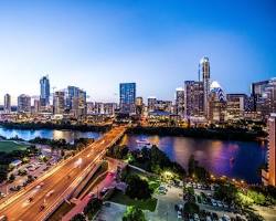 Image of Texas skyline with money raining down