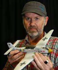 Air battle: Photographer Jim Tannock prepares for his next exhibition, Omaka Wow Wow with model aeroplanes superimposed over aerial shots over Cook Strait - 8444786