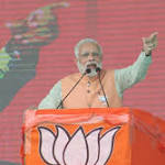 gives 'vikas' with 'suraksha', says
