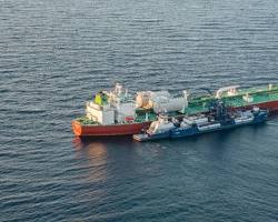Image of bunker tanker refueling a ship
