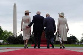 President Trump gives first lady Melania a playful tap on the tush during meeting with King Charles and Queen Camilla