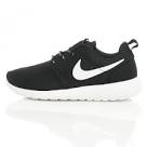 Womens black and white roshe runs