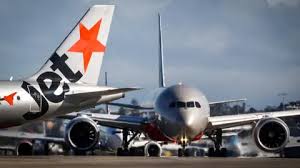 Jetstar: Mixed reactions in Australia as airline introduces fees for overhead carry-on luggage