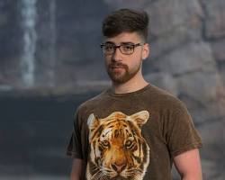 Image of person wearing a tiger print shirt