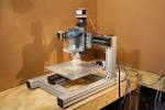 Homemade DIY CNC Machine using Stepper Motors, Dremel, and