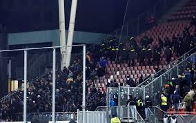 Europa League kick-off delayed as riot police throw out ENTIRE away end after major security breach