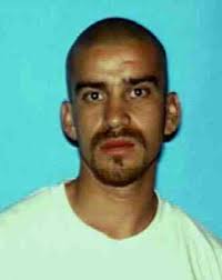 Julio Rodriguez is wanted by authorities in connection with the shooting death of Larry Duran Jr. Rodriguez drove Duran to an alley, then shot him as he ... - 6a00d8341c630a53ef0120a70f4979970b-pi
