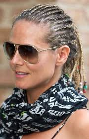 Inspired by Rihanna, Heidi went for an undercut look – but didn&#39;t actually shave off any of her hair. The colored beads improve this look slightly, ... - 7_heidi-klum