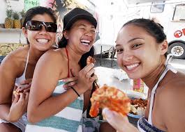 At Giovanni&#39;s Original White Shrimp Truck in Kahuku yesterday, Jackie Camit, left, Lucretia Lee and Holly Stephens bade their shrimps goodbye before digging ... - artwildx
