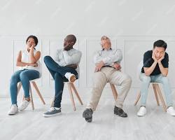 nervous person sitting in a waiting room for a job interviewの画像