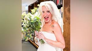 Bride dazzles in thrifty wedding with £2 charity shop dress — BBC
