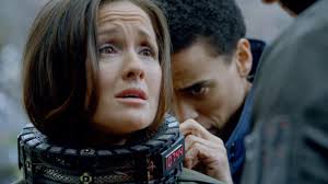 Dorian (Michael Ealy) works to remove the explosive necklace. Anyway here comes the plot from Hell. This mad bomber is playing Simon Says because he&#39;s ... - almost-human-season-1-episode-8-you-are-here