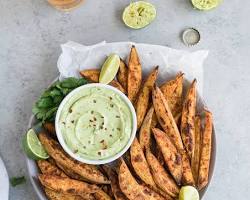 Image of Spiced Tuna Burgers with Avocado Aioli and Sweet Potato Fries