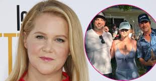 Amy Schumer Celebrates 'Epic' July 4th in Plunging Top as She Flaunts Her Slim Figure: Photo