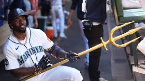Randy Arozarena celebrates after hitting a walk off home run for the Seattle Mariners