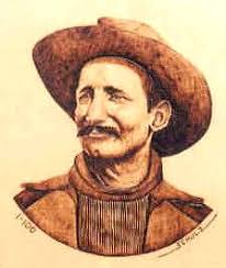 Portrait of Felix Pedro, detail. No. 1-100 of Limited Edition, by Tom Schulz, 2002. Pyrography on Birch wood mounted in a prospector&#39;s goldpan - ts_felix_pedro_dtl