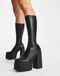 NOKWOL Emmie platform knee boots in black | ASOS