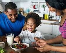 Image of person enjoying a balanced meal rich in vitamins