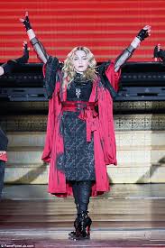 Image result for photos of Madonna exposing the breast of a fan