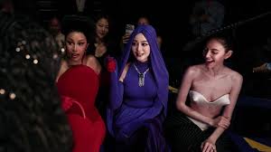 Cardi B stuns in dramatic red gown in Paris. See the over-the-top look