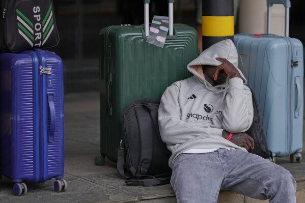 Kenya aviation workers end strike that paralyzed airport operations in the capital; traveler Hellen Moraa says delays could cost her financially