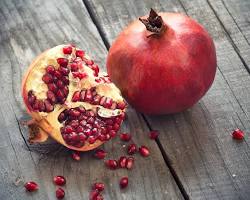 Image of Smashing a pomegranate against your front door