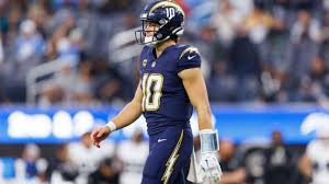 Chargers' Herbert (hand) preparing to play MNF