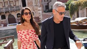 Amal Clooney Brings Stella McCartney's Raspberry Maxi Dress to Venice