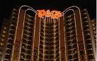 Vegas police: Man dead, woman held in slaying at downtown hotel