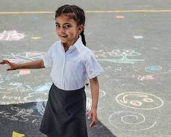 girl wearing a Jet school skirt
