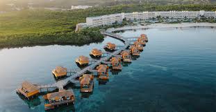 This Adults-Only Jamaica All-Inclusive Resort Just Reopened — With 401 Ocean-View Suites, a Rooftop Infinity Pool, and Overwater Bungalows