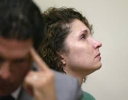 Patti Sapone/The Star-LedgerMelanie McGuire in court this morning. Her lawyer, Joseph Tacopina, is at left. - large_amelanie3