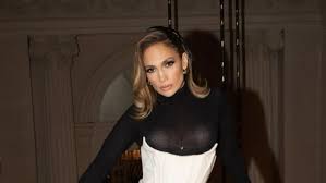 Jennifer Lopez's Dazzling Coquette Look: The Cream Corset Pantsuit Power - 1