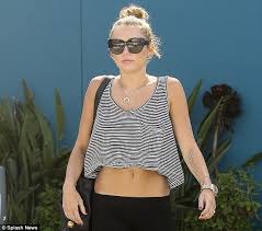 Miley Cyrus reveals her new tattoo... a quote from President ... via Relatably.com