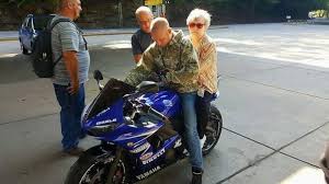 While riding with friends at the Go Mart in Clay, WV, I met a lady who asked if someone could give her a quick ride on a motorcycle—for $20—because it was on