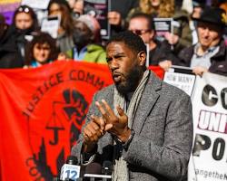 Image of Advocate speaking at public rally