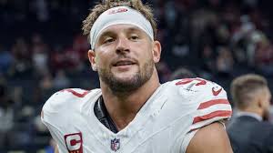 Megan Moroney supporting Nick Bosa