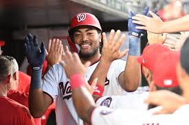Nationals score 11 straight runs, then just hang on