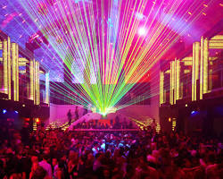 Miami Beach's vibrant nightlife scene with people dancing and enjoying drinks