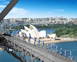 person climbing the Sydney Harbour Bridge